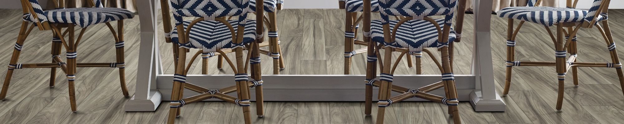 Dining room with Repel Laminate flooring - Wood-look laminate flooring from Novakoski Floor Covering in Anderson, IN